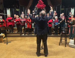 Christmas Eve Candle Light Service - December 24, 2024 - Rev, Ed Thompson conducts choir