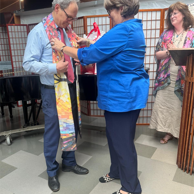 Rev. Alan Taylor receives “Tree of Life” stole from Beth Cliff
