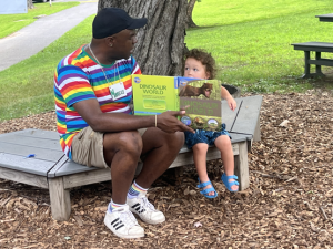 Oly and Marcus read a book